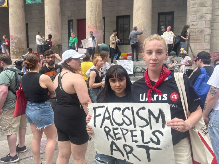 Students, faculty and alumni gathered in front of the University of the Arts campus