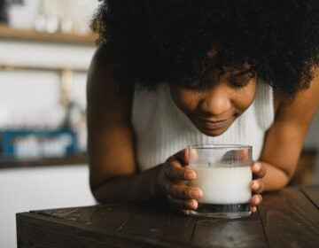 woman smells candle