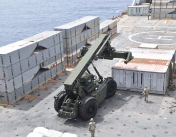 Army supplies on a boat