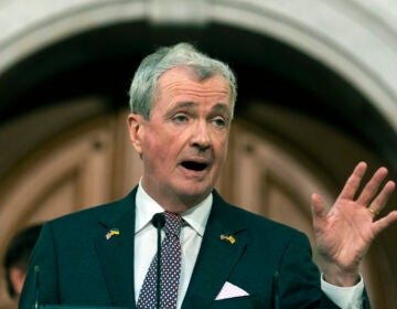 Phil Murphy speaking at a podium