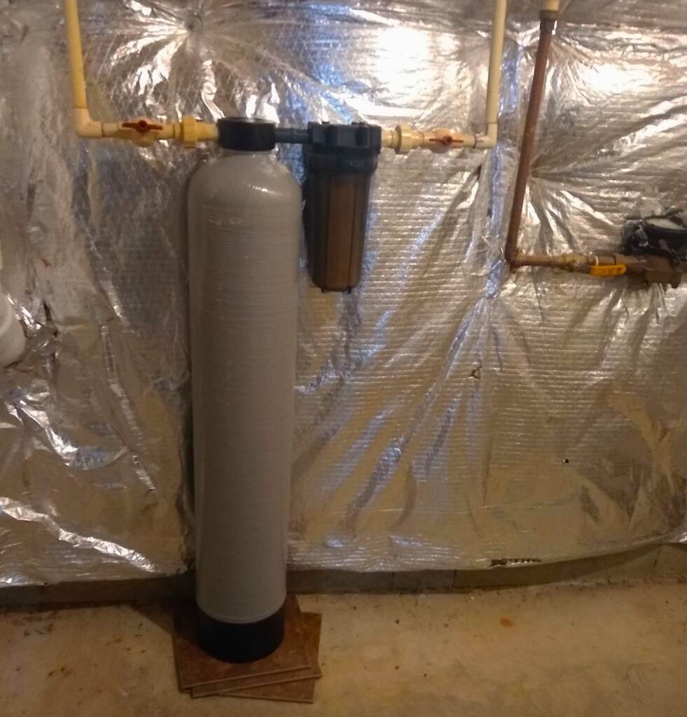 Water filtration tank in a basement