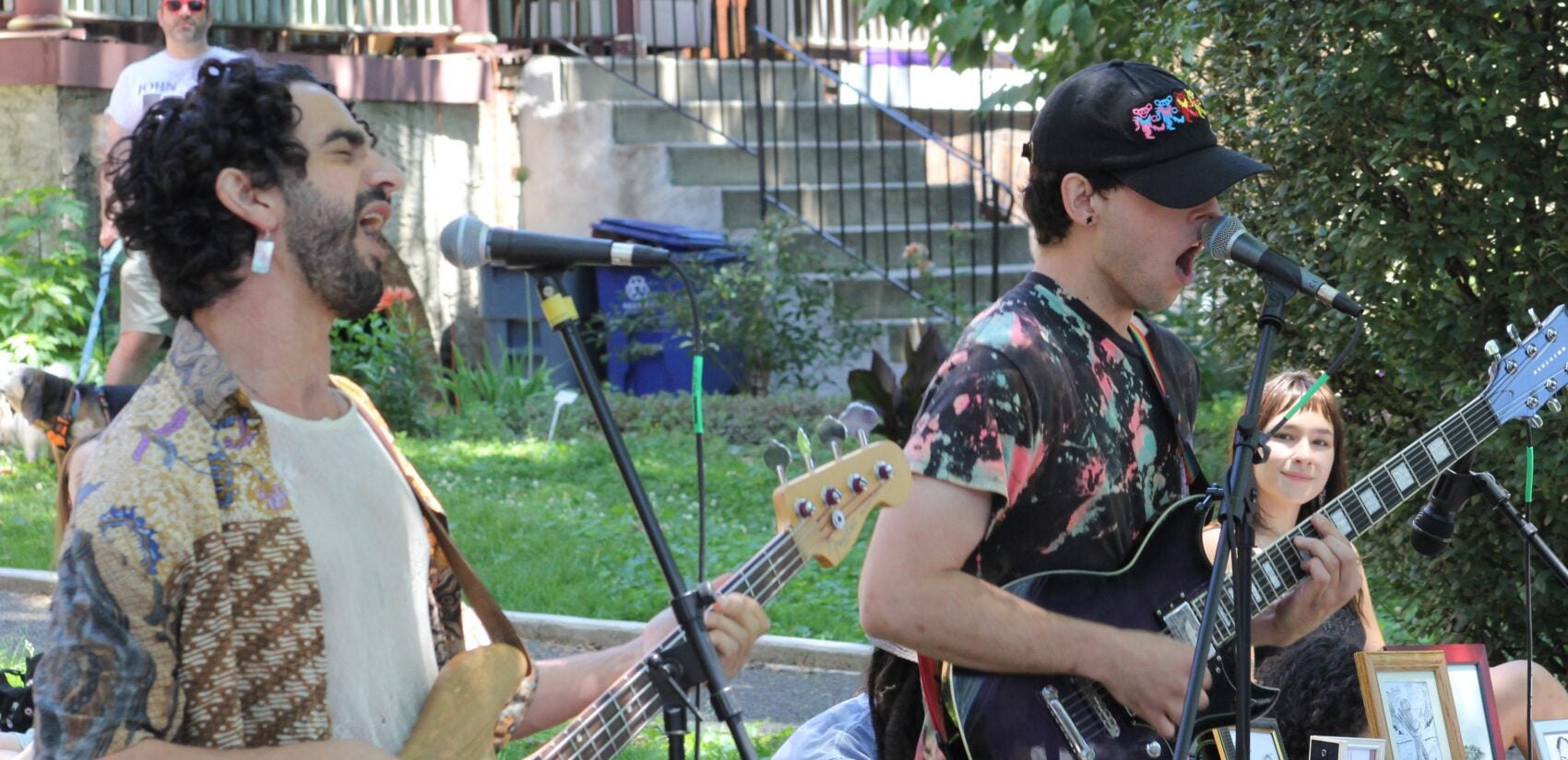 a band plays in a yard