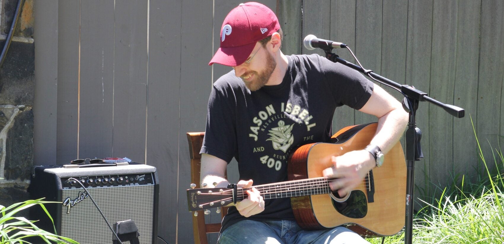 a person plays guitar