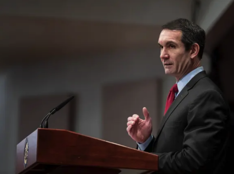 Eugene DePasquale speaking at a podium