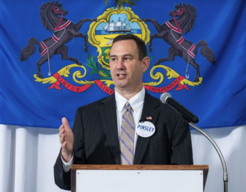 Mark Pinsley speaking at a podium